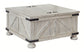 Ashley Express - Carynhurst Cocktail Table with Storage at Towne & Country Furniture (AL) furniture, home furniture, home decor, sofa, bedding