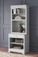 Ashley Express - Kanwyn Bookcase at Towne & Country Furniture (AL) furniture, home furniture, home decor, sofa, bedding