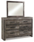 Wynnlow Queen Crossbuck Panel Bed with Mirrored Dresser, Chest and 2 Nightstands at Towne & Country Furniture (AL) furniture, home furniture, home decor, sofa, bedding